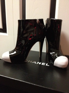 In all of their black and white patent leather shine.